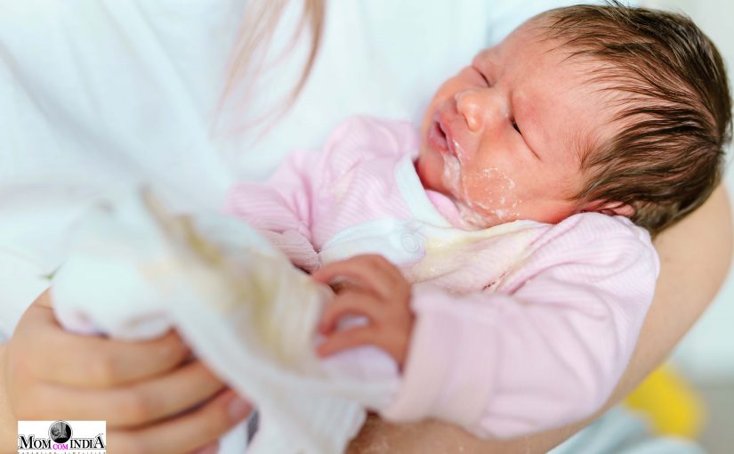 Baby Spit Up | Why Is Your Newborn Throwing Up & What Should You Do?