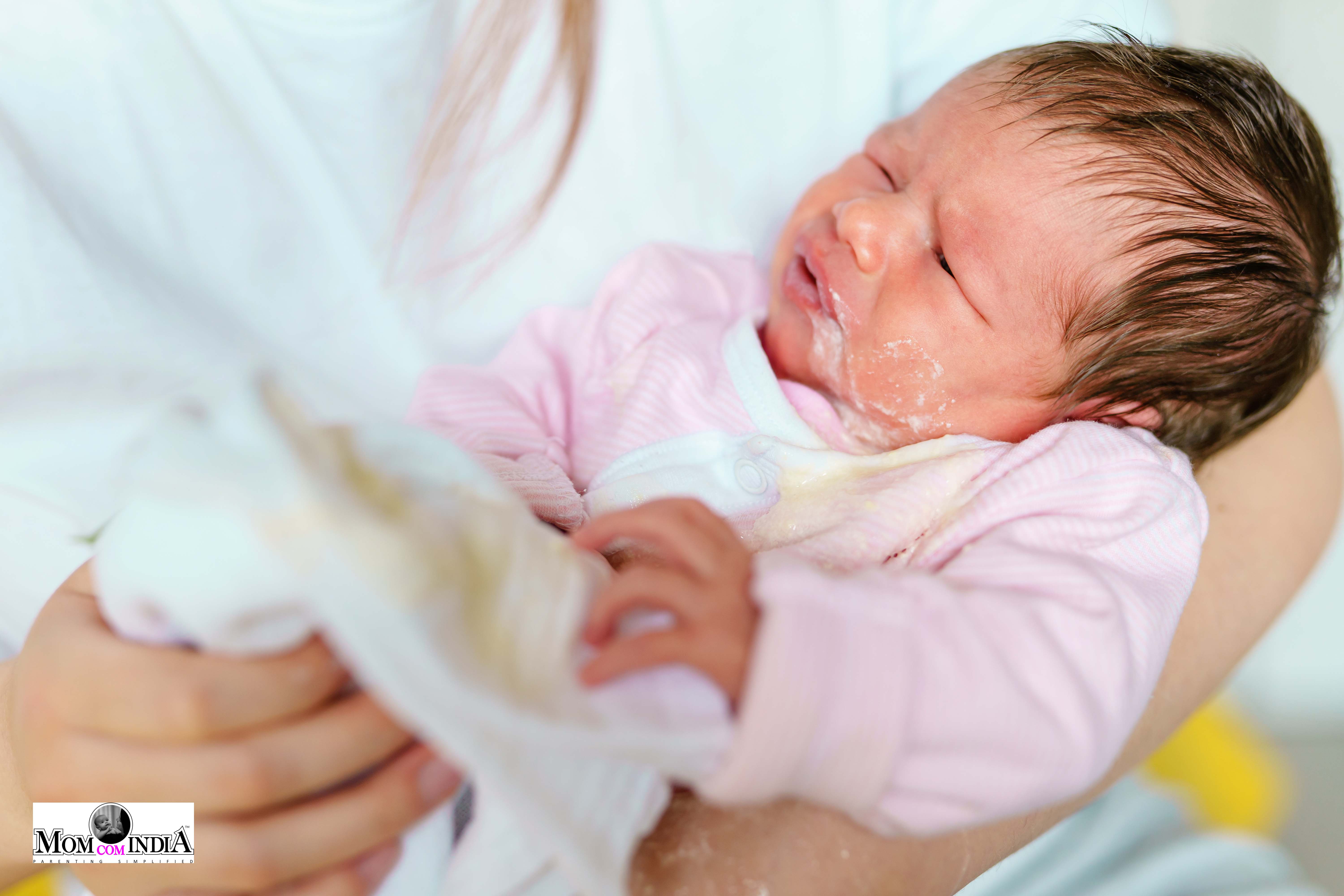 Why Is My Baby Spitting Up While Feeding